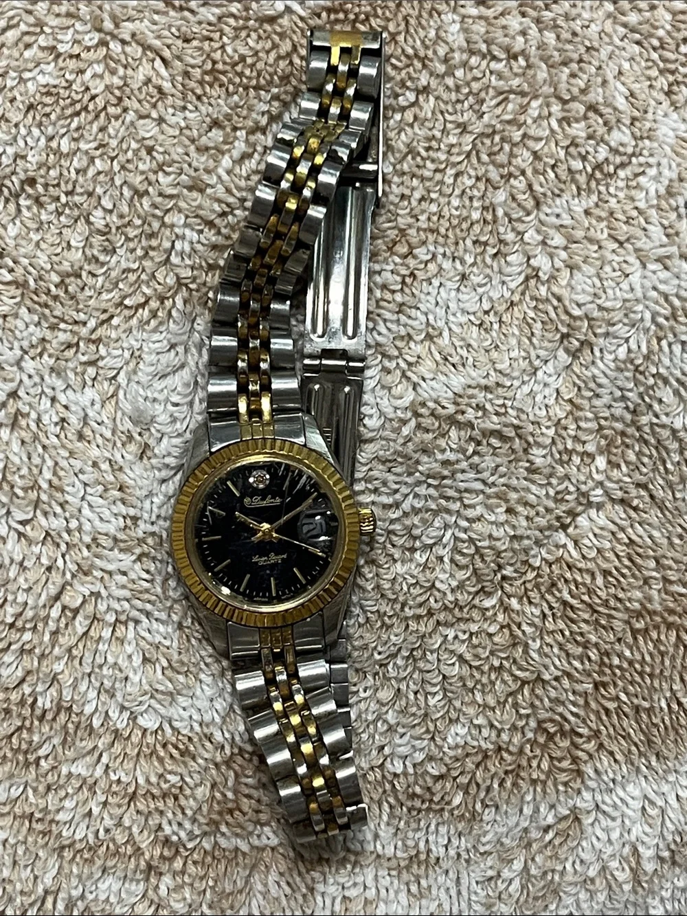 Two-Tone Women's Dress Watch with Black Dial and Gold Accents